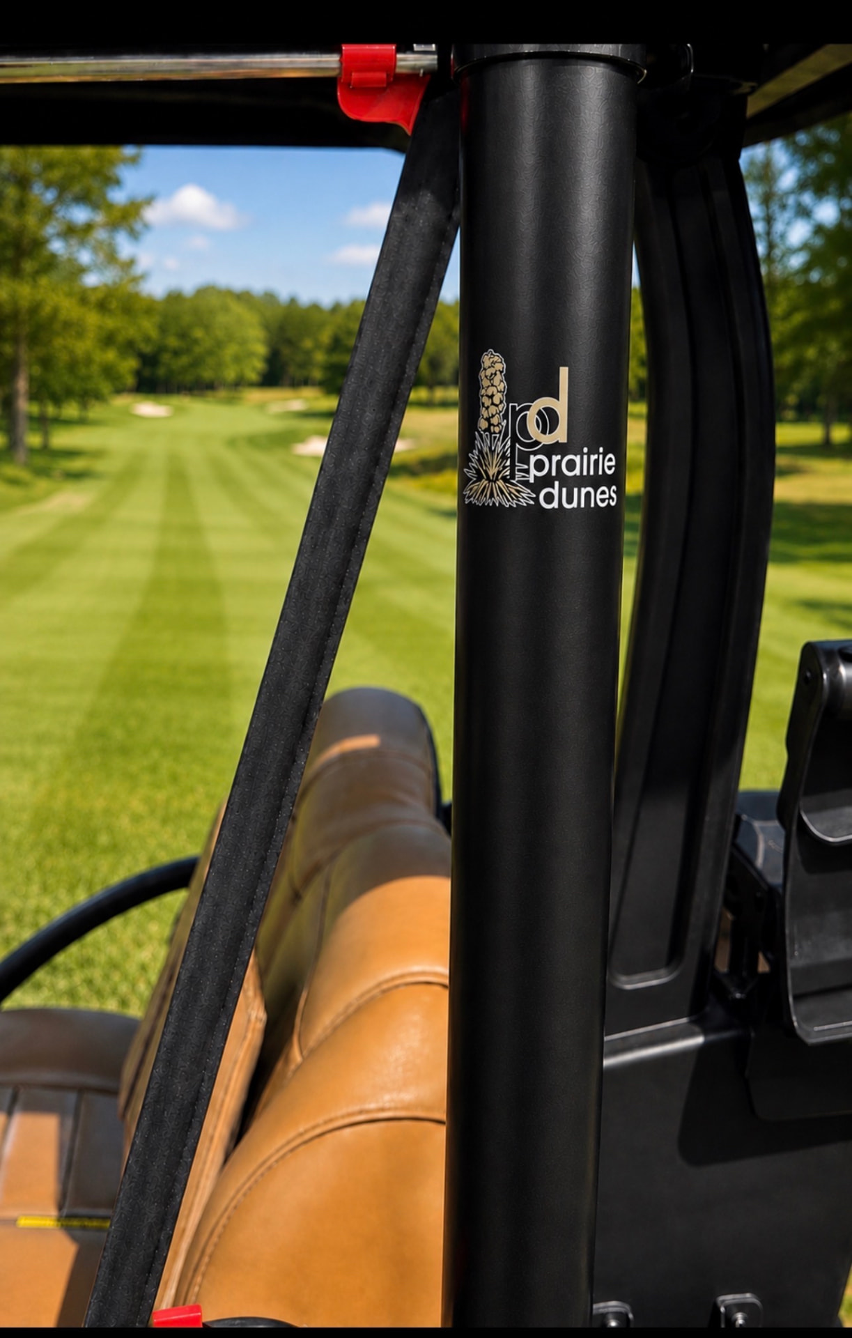 A TopHat enclosure cylinder personalized with the Prairie Dunes country club crest, applied by Groove Low